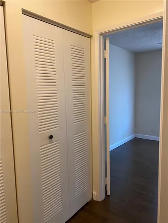 a kitchen with stainless steel appliances granite countertop a refrigerator stove and microwave