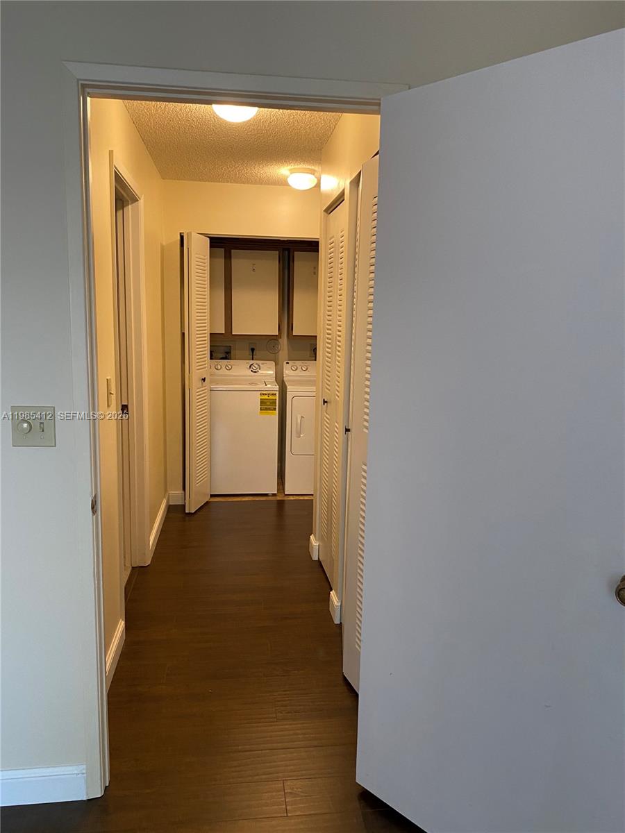 18595 Egret Way, Unit 18595 Boca Raton, FL 33496 - Photo 25 of 66 a view of a hallway with a white walls