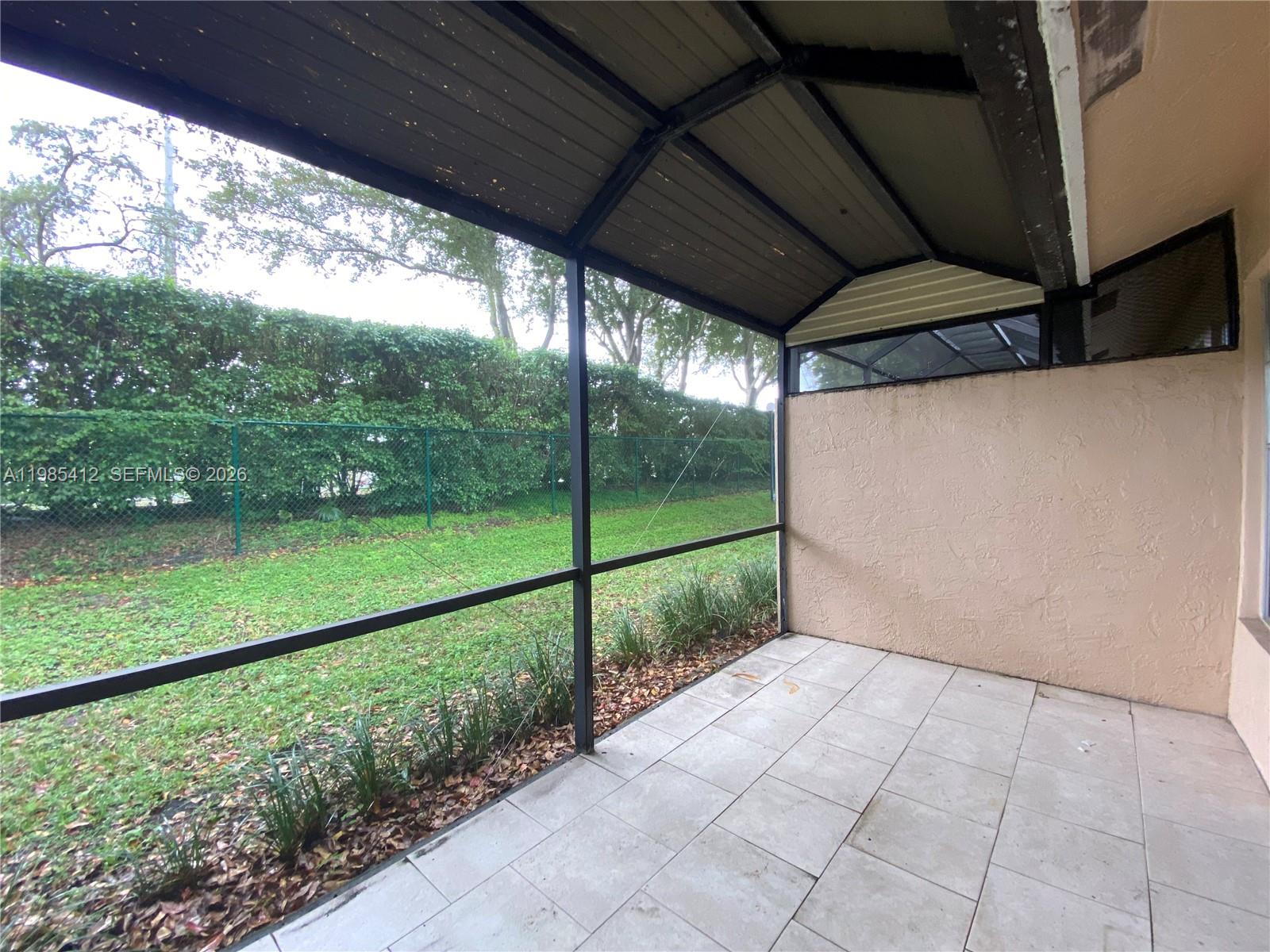 18595 Egret Way, Unit 18595 Boca Raton, FL 33496 - Photo 63 of 66 a view of backyard with green space