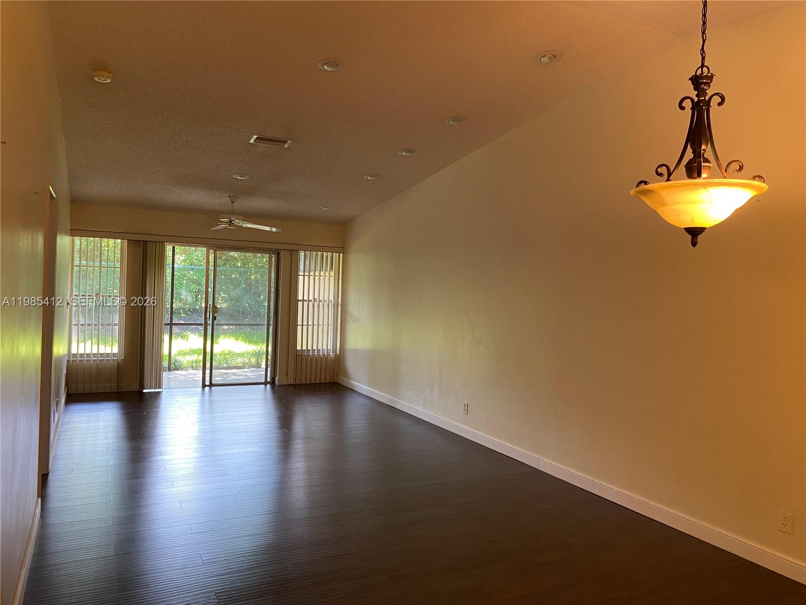 18595 Egret Way, Unit 18595 Boca Raton, FL 33496 - Photo 8 of 66 a view of an empty room with a window