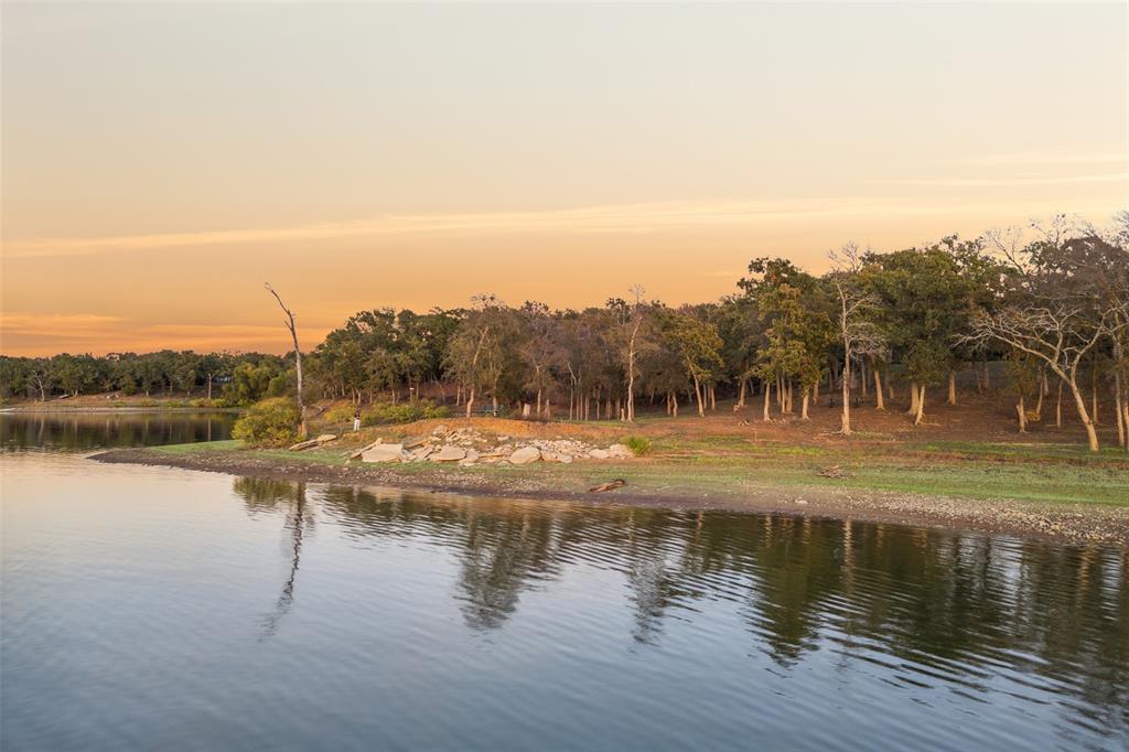 350 West Dickson Lane Oak Point, TX 75068 - Photo 20 of 23 a view of a lake with houses