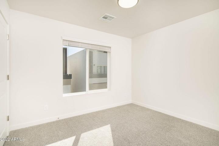 4210 North 28th Street, Unit 1 Phoenix, AZ 85016 - Photo 5 of 9 an empty room with a window