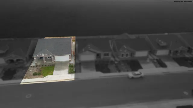 an empty room with a wooden floor and a window