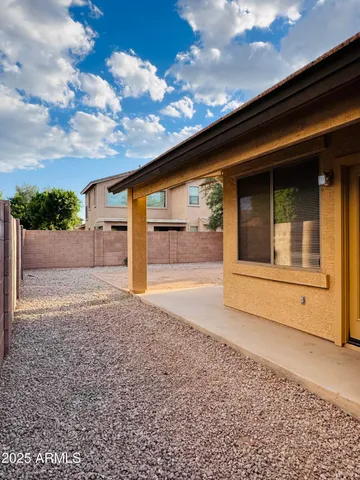 a house view with a garden space
