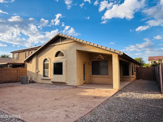 a front view of a house with a garage