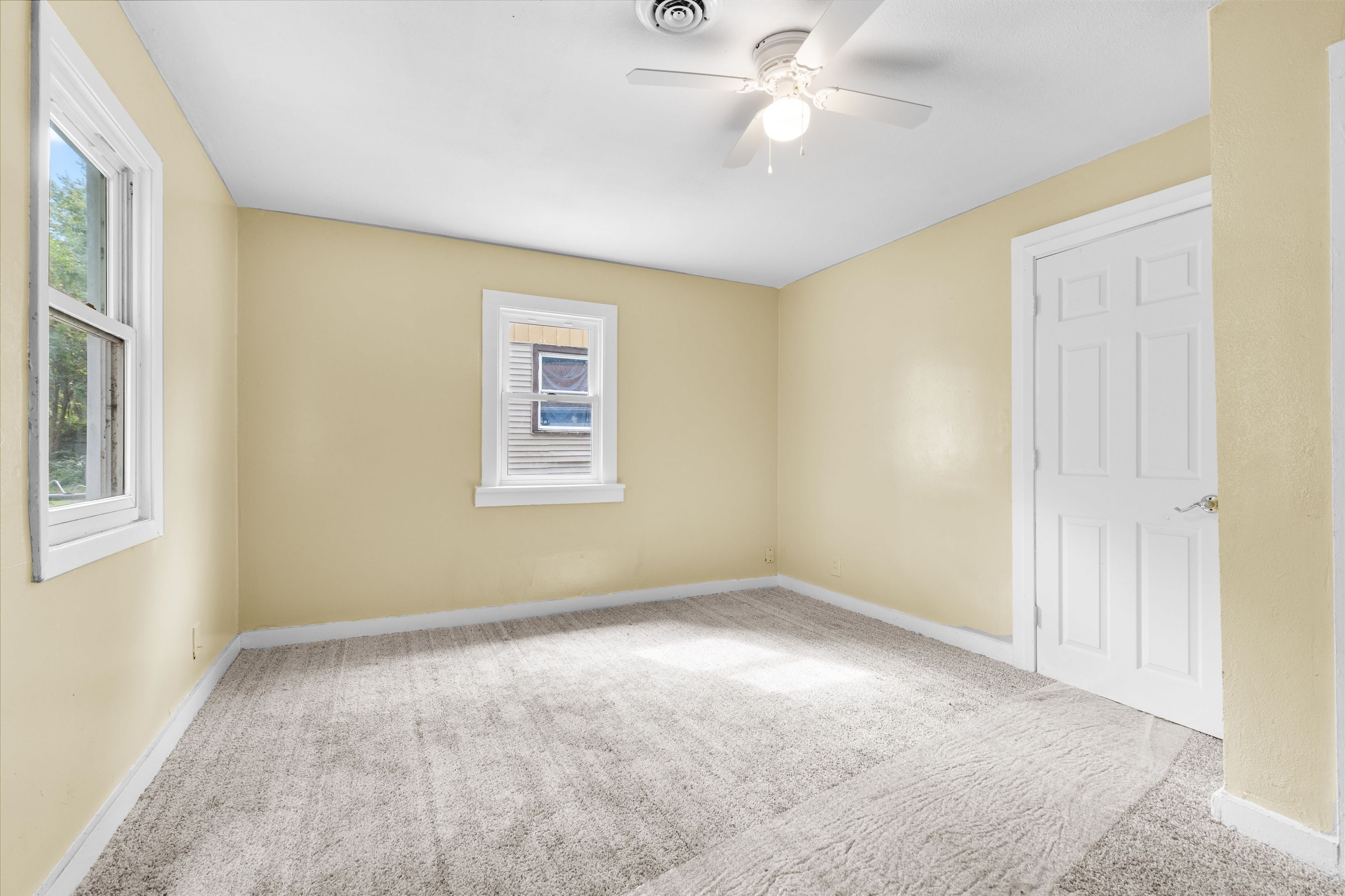 619 Fitch Road Rockford, IL 61109 - Photo 6 of 10 a view of an empty room with a window
