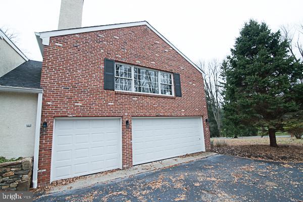 118 Jaffrey Road Malvern, PA 19355 - Photo 8 of 48 Three car attached garage with openers