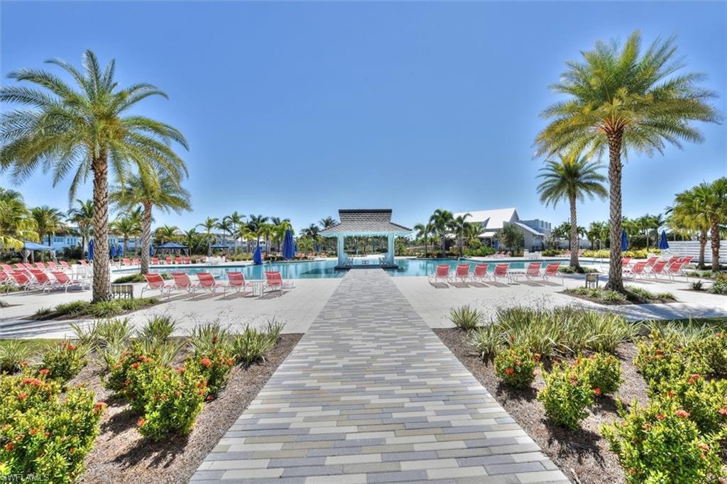 7315 Cayo Coco Lane Naples, FL 34113 - Photo 22 of 30 a view of multiple houses with swimming pool