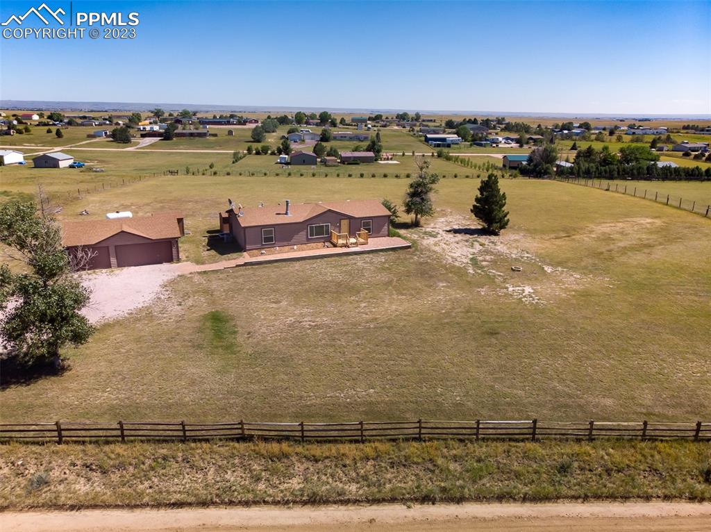 5695 Peerless Farms Road Peyton, CO 80831 - Photo 3 of 50 a view of a lake view
