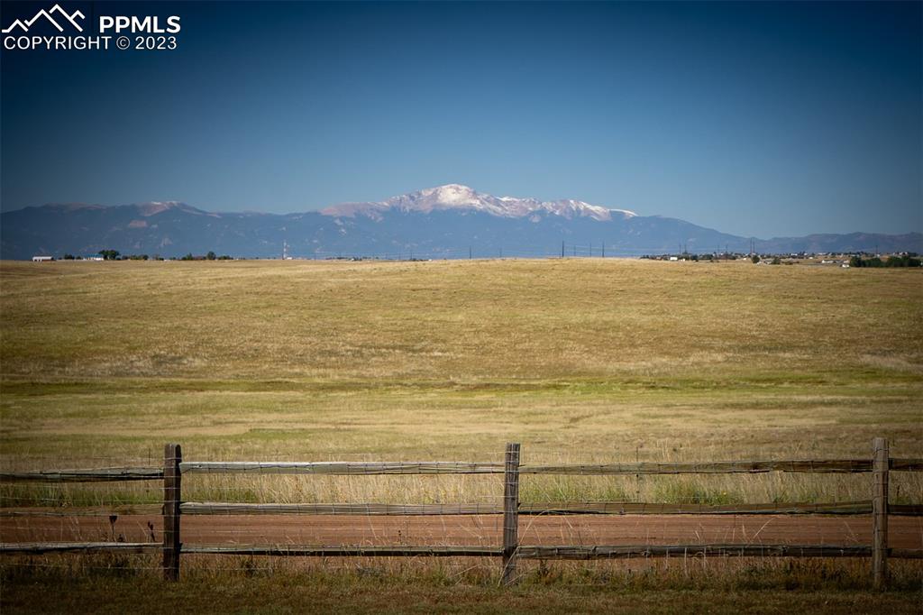 5695 Peerless Farms Road Peyton, CO 80831 - Photo 4 of 50 a view of an ocean and mountain