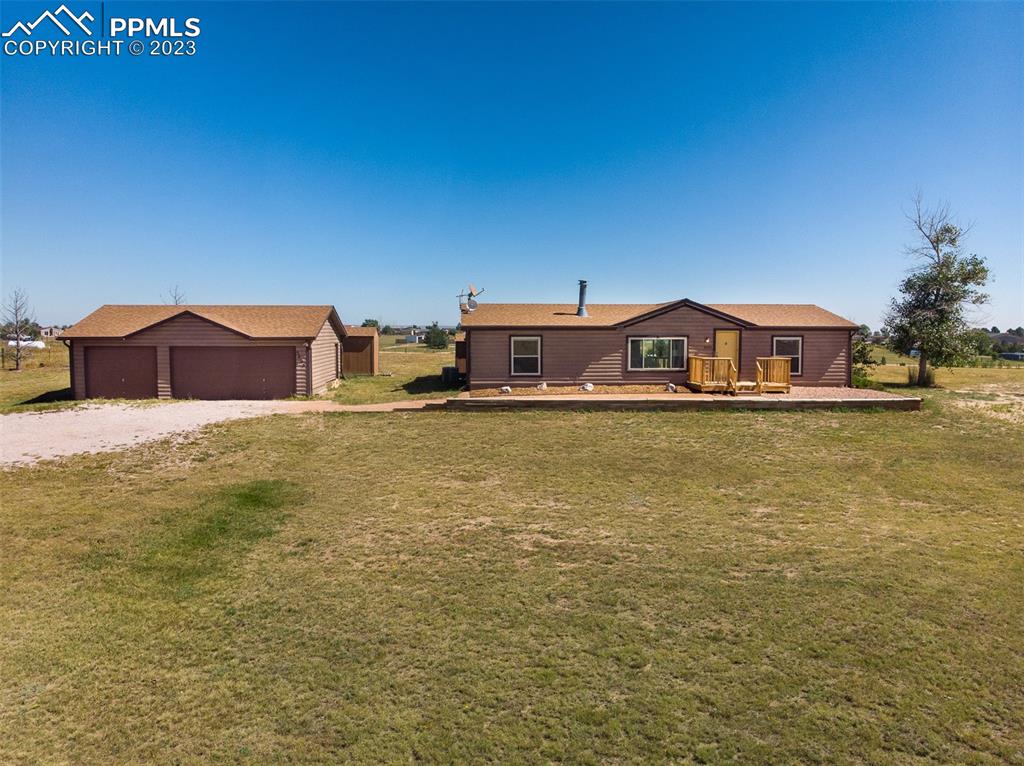 5695 Peerless Farms Road Peyton, CO 80831 - Photo 42 of 50 a view of residential houses with an ocean view