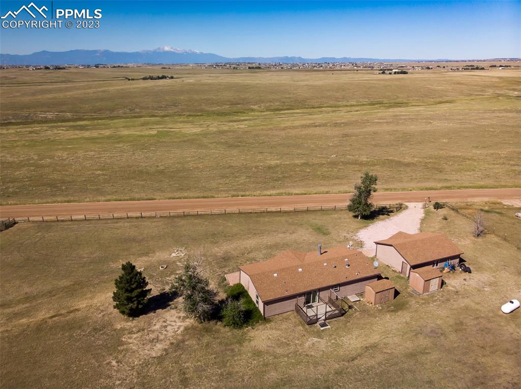 5695 Peerless Farms Road Peyton, CO 80831 - Photo 43 of 50 a view of an ocean and beach