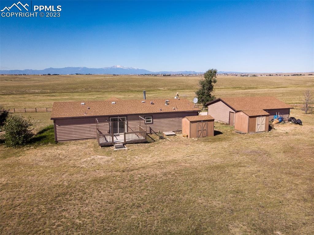 5695 Peerless Farms Road Peyton, CO 80831 - Photo 44 of 50 a view of a ocean with beach