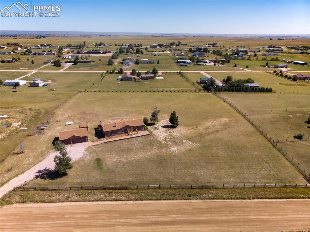 5695 Peerless Farms Road Peyton, CO 80831 - Photo 45 of 50 an aerial view of a houses with outdoor space