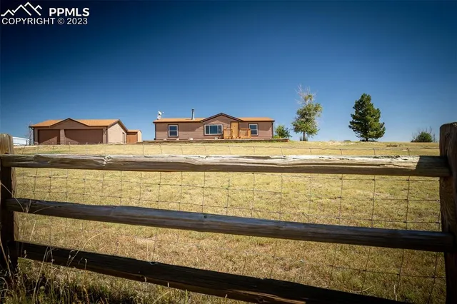 a house view with a lake view