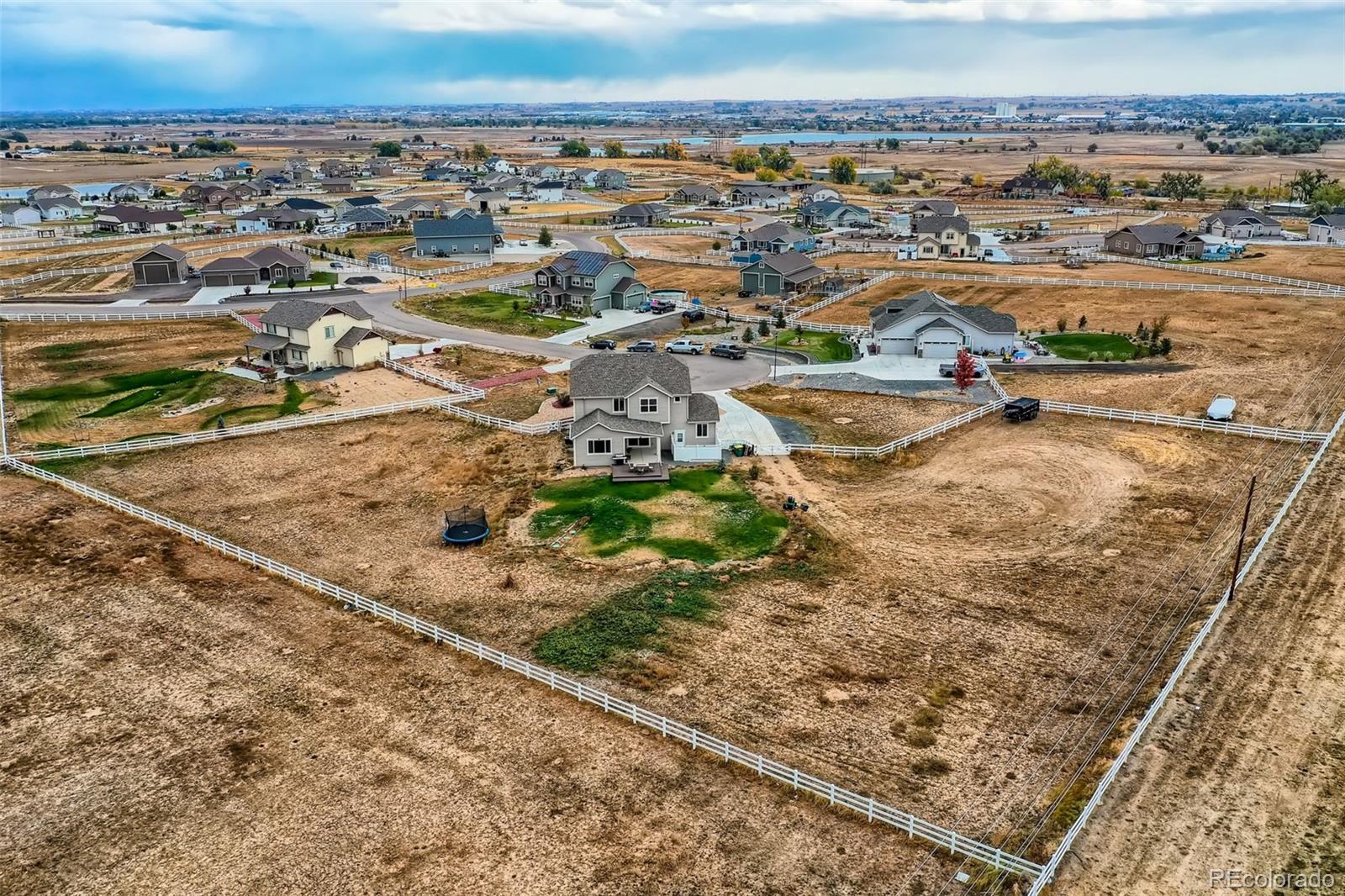 16035 Newark Lane Brighton, CO 80602 - Photo 2 of 40 an aerial view of residential houses with outdoor space