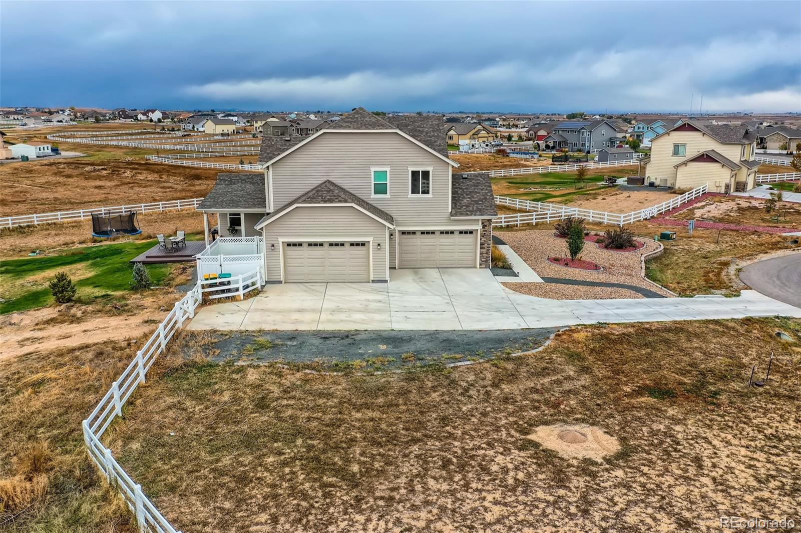 16035 Newark Lane Brighton, CO 80602 - Photo 3 of 40 a view of a city with lawn chairs