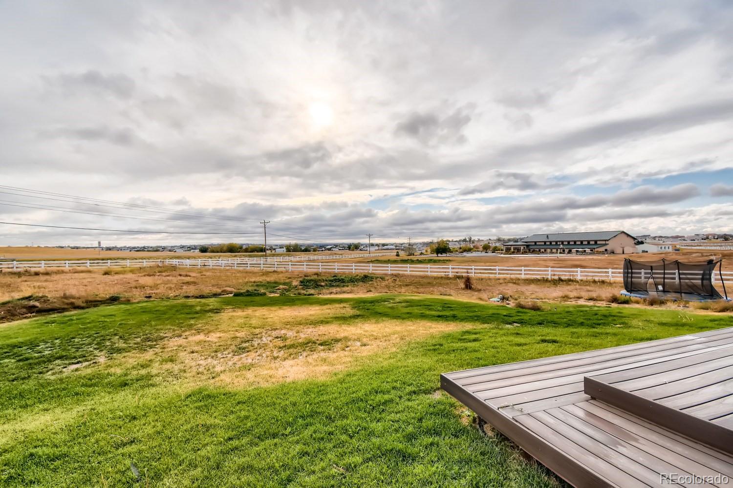 16035 Newark Lane Brighton, CO 80602 - Photo 37 of 40 a view of an ocean from a balcony