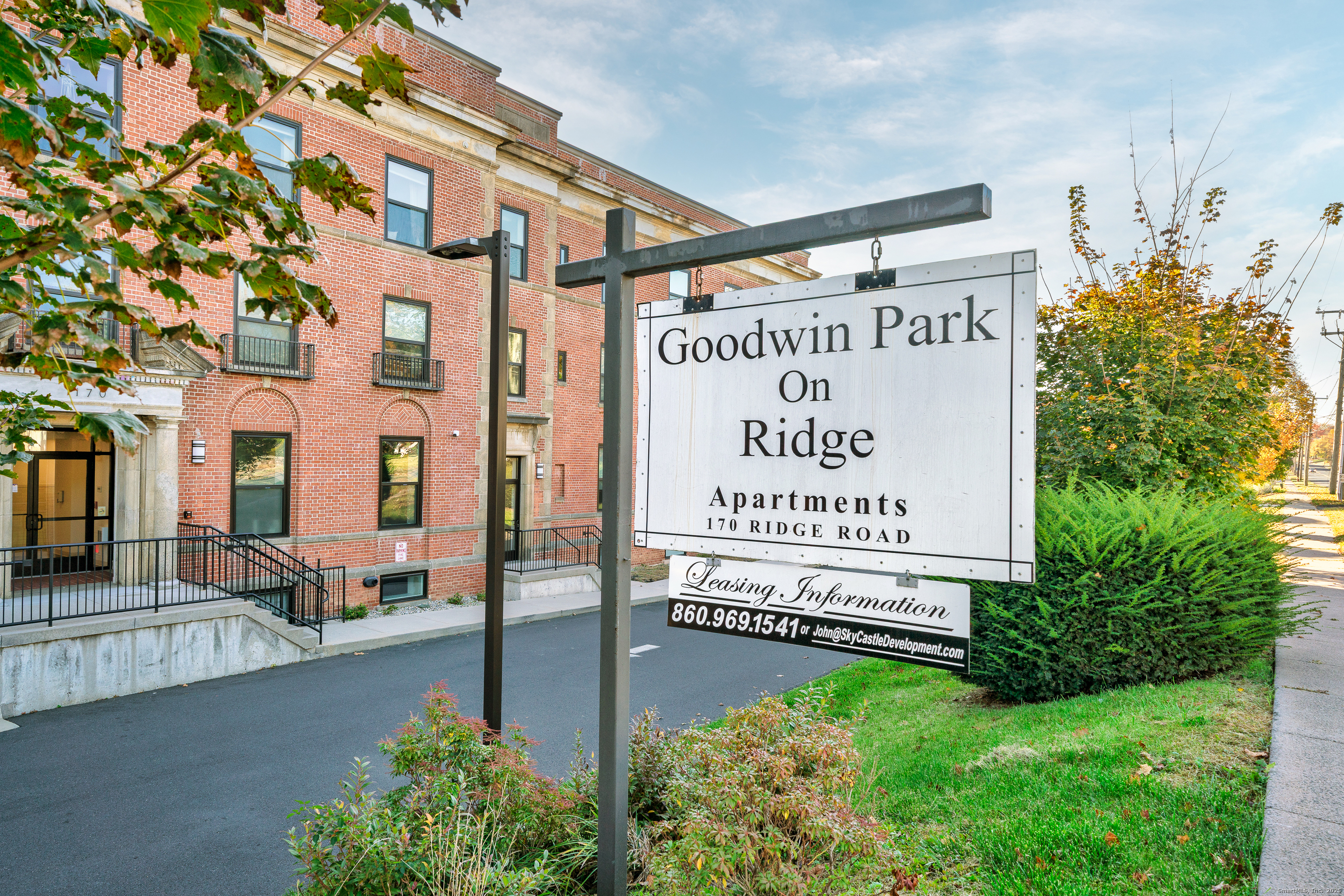 170 Ridge Road, Unit 104 Wethersfield, CT 06109 - Photo 3 of 23 a sign on the side of a building