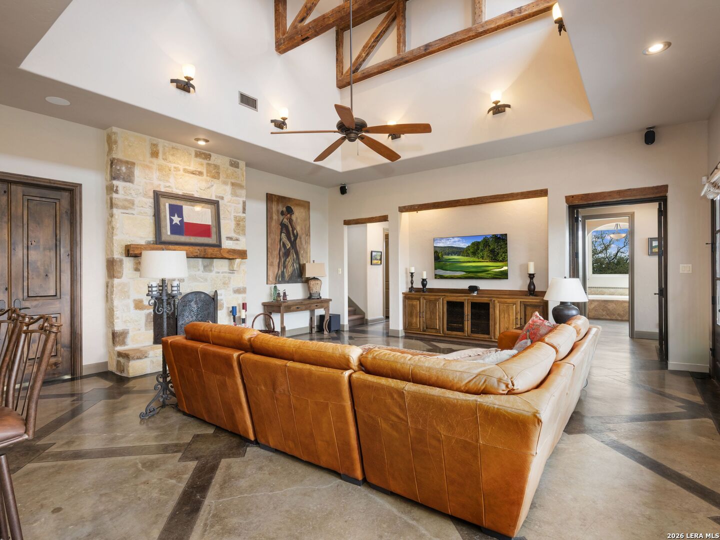 2717 B & R Road Utopia, TX 78884 - Photo 22 of 70 a living room with fireplace furniture and a chandelier
