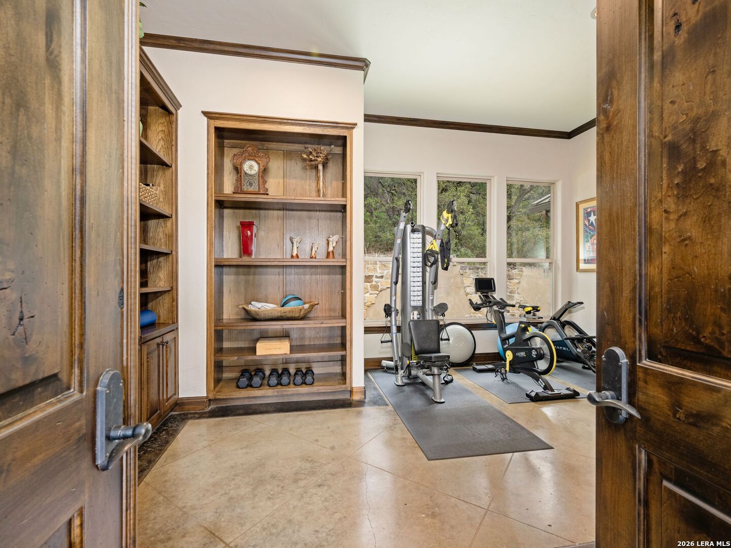 2717 B & R Road Utopia, TX 78884 - Photo 30 of 70 a room with gym equipment and large windows