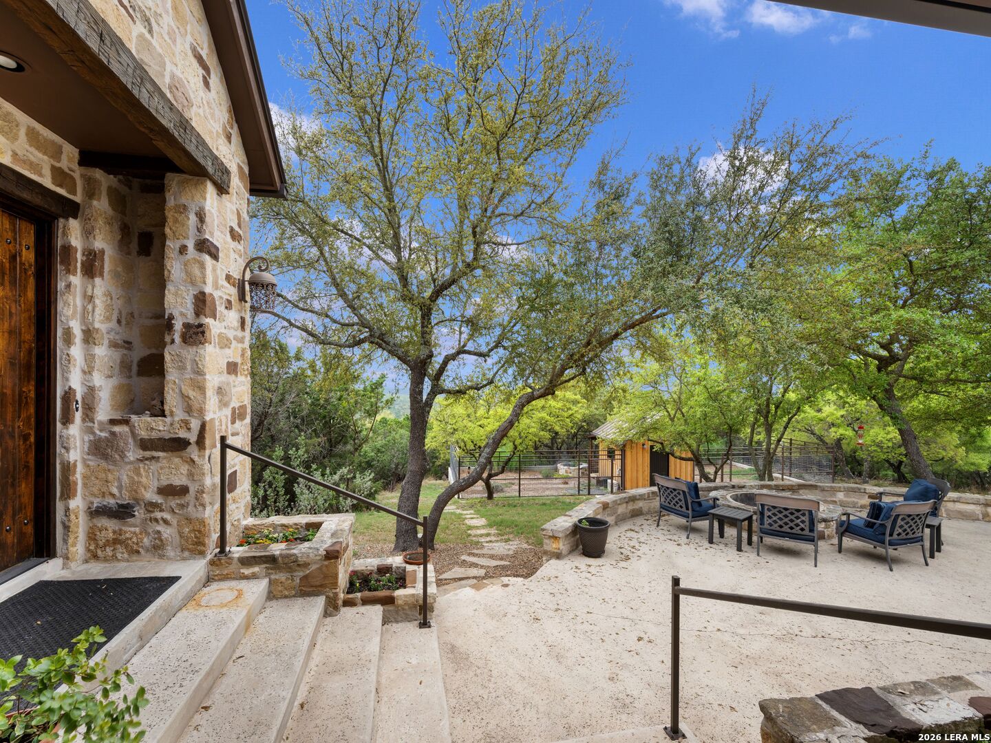 2717 B & R Road Utopia, TX 78884 - Photo 39 of 70 a view of backyard with outdoor seating and trees