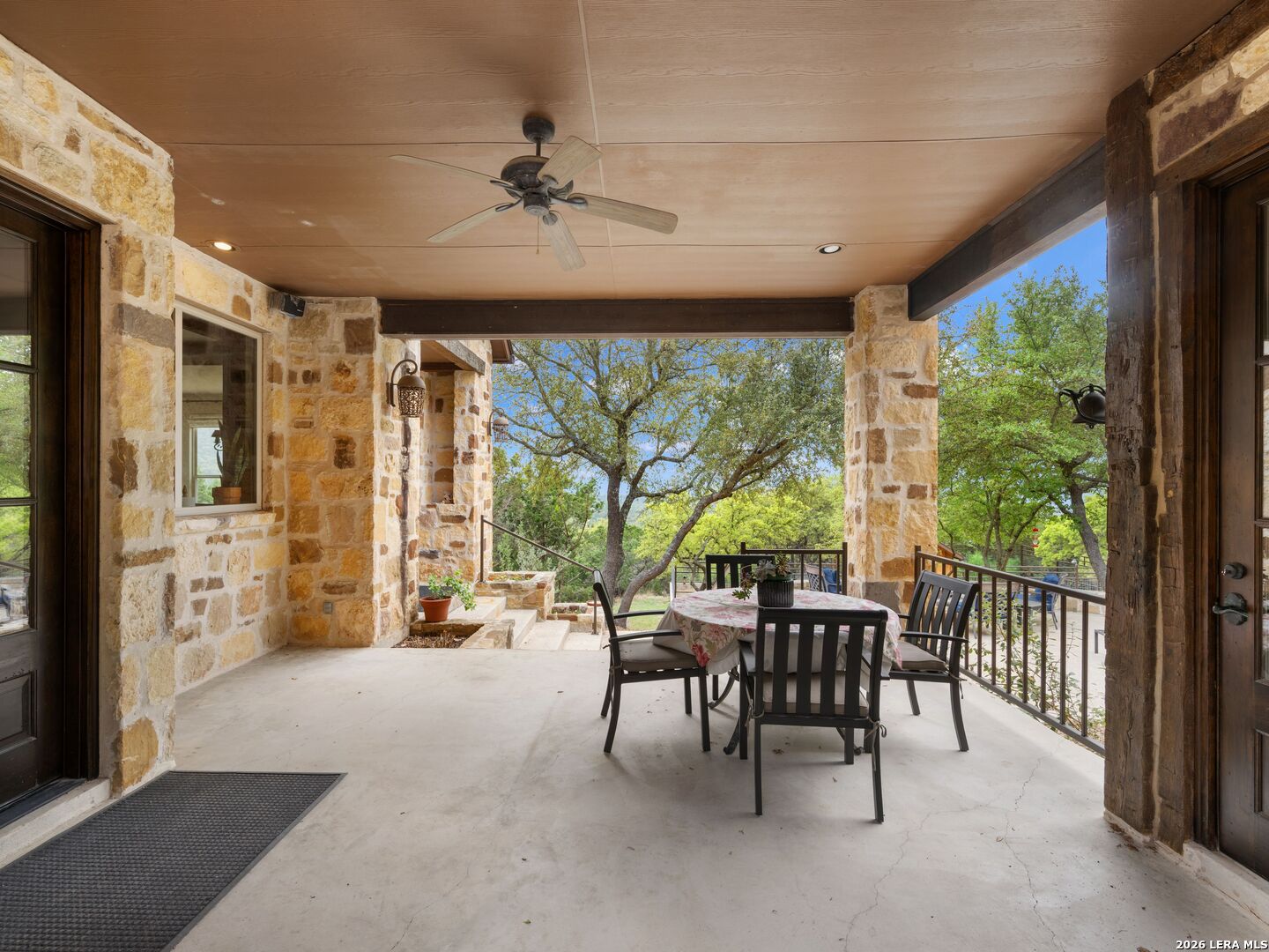 2717 B & R Road Utopia, TX 78884 - Photo 42 of 70 a dining room with furniture and a floor to ceiling window
