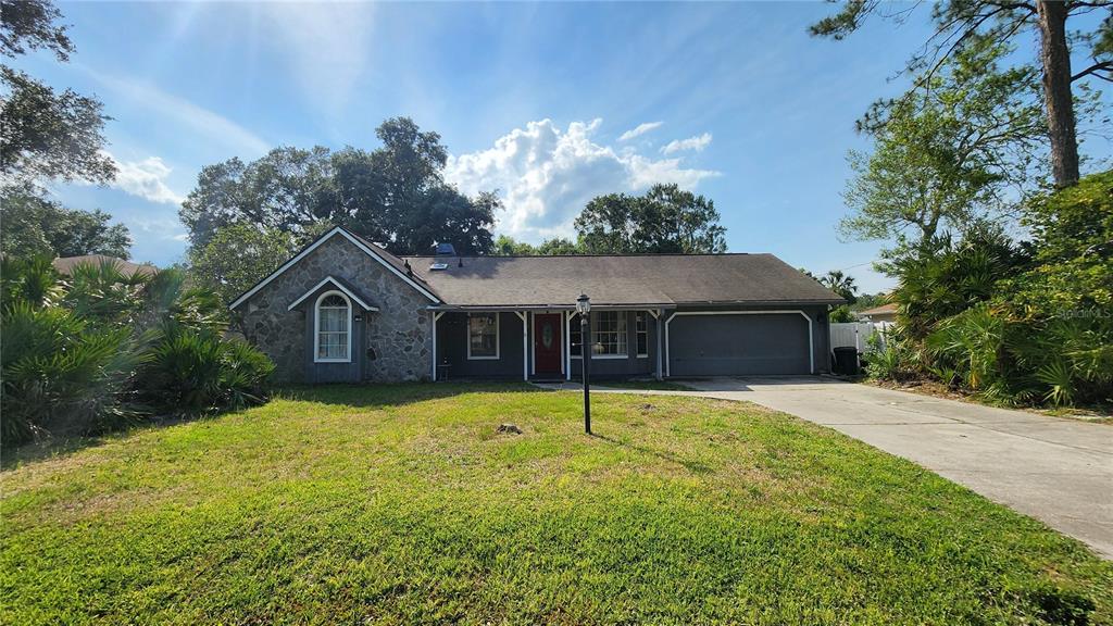 a house view with a outdoor space