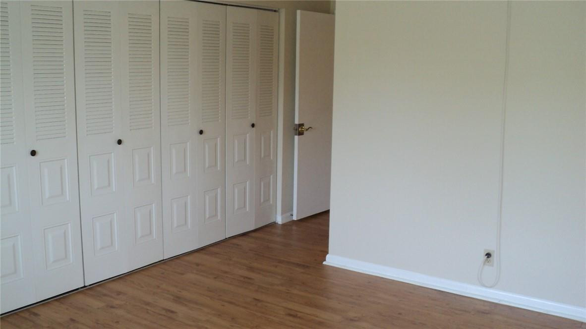 140 Northwest 70th Street, Unit 1020 Boca Raton, FL 33487 - Photo 7 of 12 Bedroom with Flooring