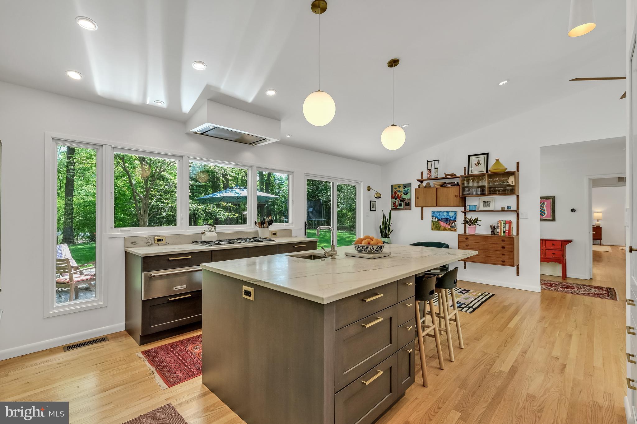 8303 Still Spring Court Bethesda, MD 20817 - Photo 21 of 56 a kitchen with a stove and a wooden floors