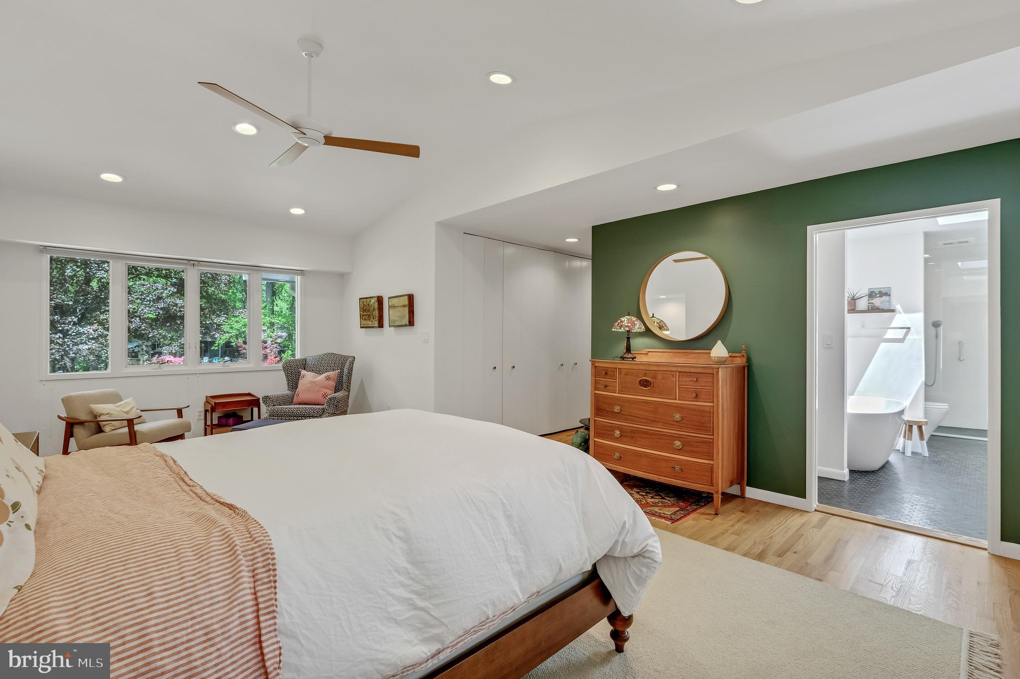 8303 Still Spring Court Bethesda, MD 20817 - Photo 27 of 56 a bed room with a bed mirror and a window