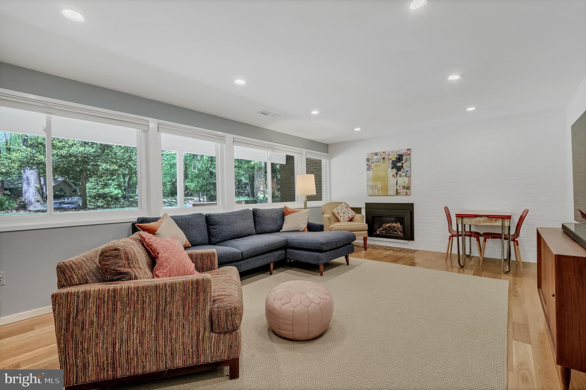 8303 Still Spring Court Bethesda, MD 20817 - Photo 41 of 56 a living room with furniture and a large window