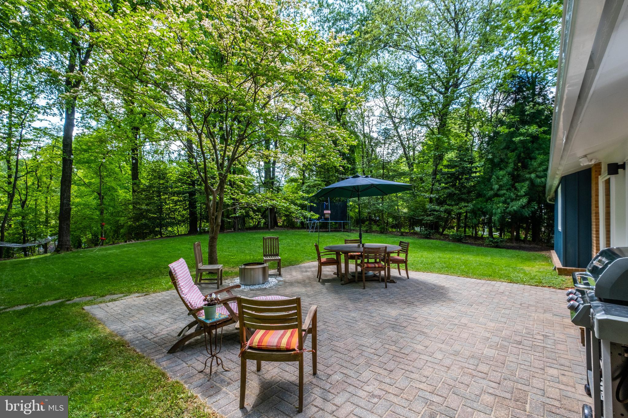 8303 Still Spring Court Bethesda, MD 20817 - Photo 47 of 56 a view of outdoor space yard deck patio and outdoor kitchen