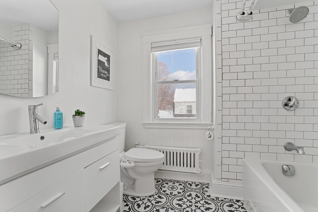1 Brae Burn Road Milton, MA 02186 - Photo 13 of 16 a bathroom with a sink a toilet and shower