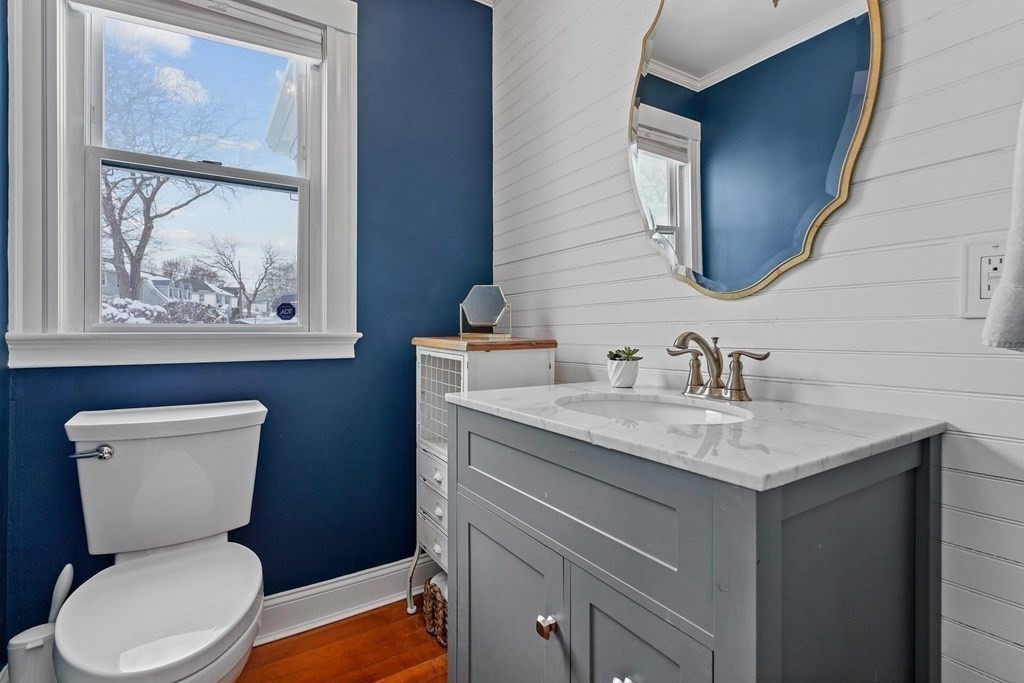1 Brae Burn Road Milton, MA 02186 - Photo 8 of 16 a bathroom with a toilet a sink and mirror