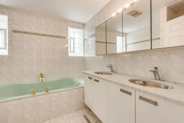 a bathroom with a sink and a bathtub