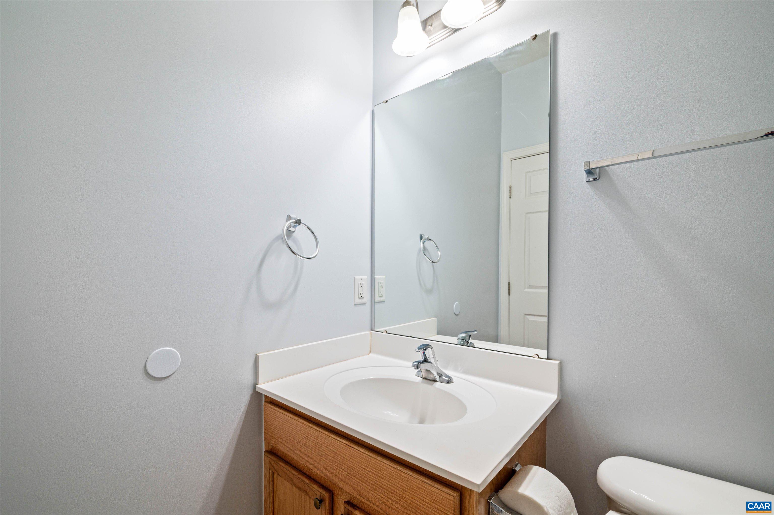 709 Rainier Road Charlottesville, VA 22903 - Photo 12 of 53 a bathroom with a sink toilet and vanity