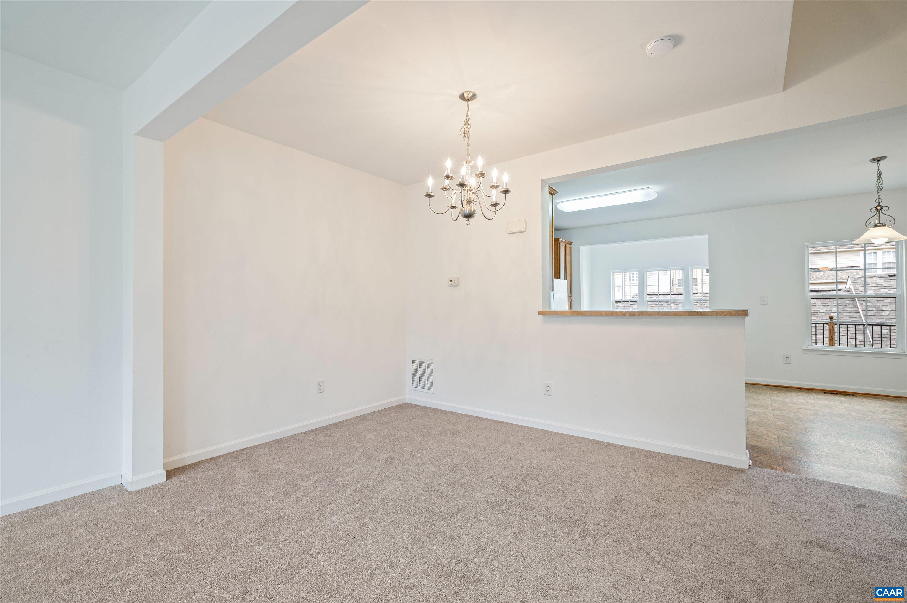 709 Rainier Road Charlottesville, VA 22903 - Photo 16 of 53 wooden floor in an empty room with a window