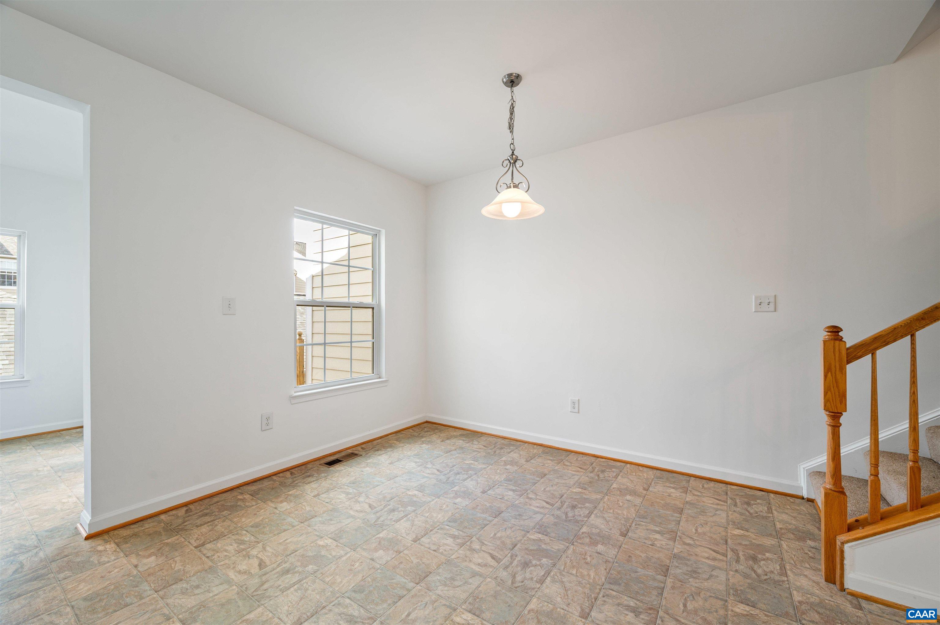709 Rainier Road Charlottesville, VA 22903 - Photo 26 of 53 an empty room with windows