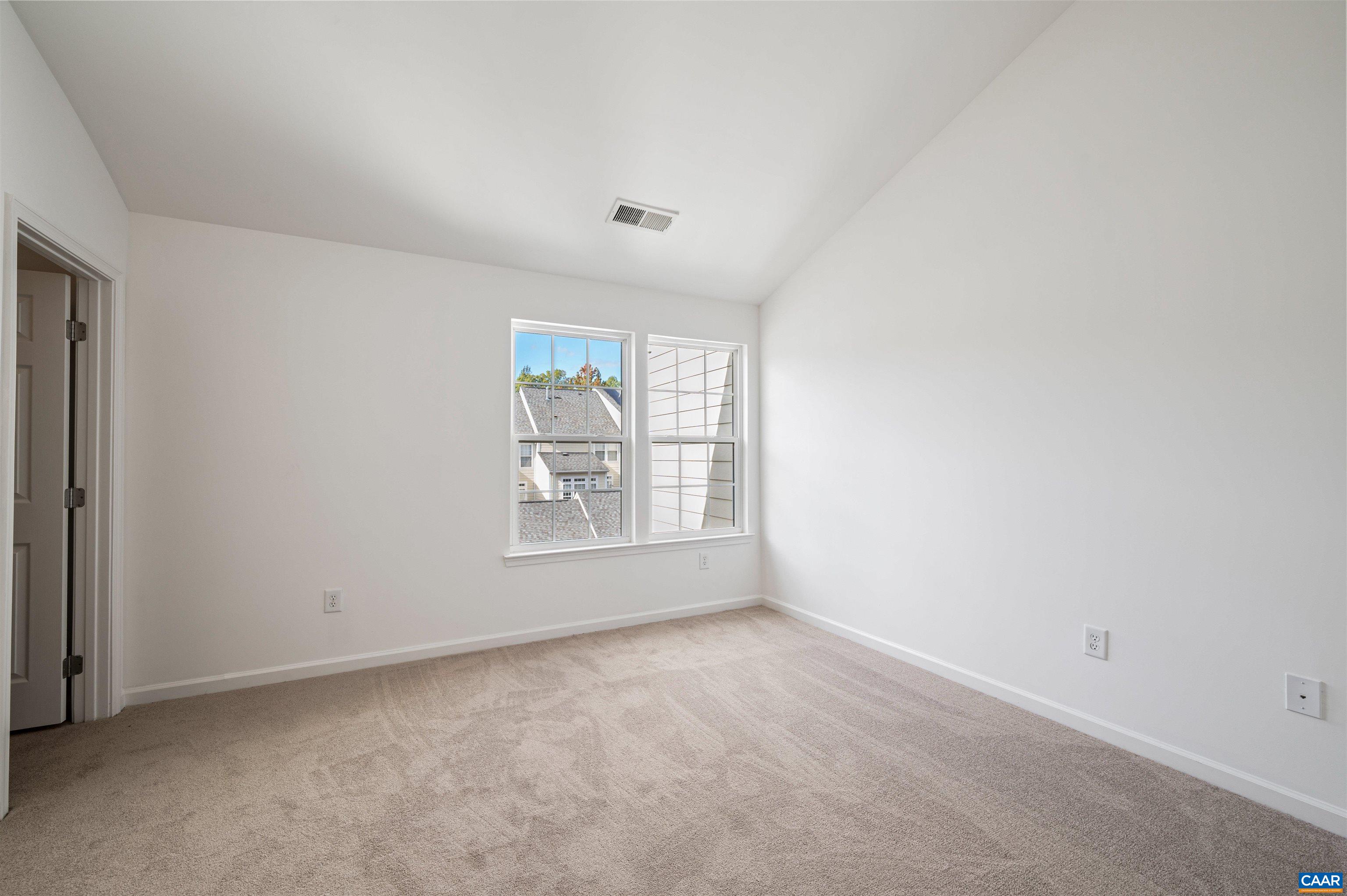 709 Rainier Road Charlottesville, VA 22903 - Photo 32 of 53 an empty room with windows