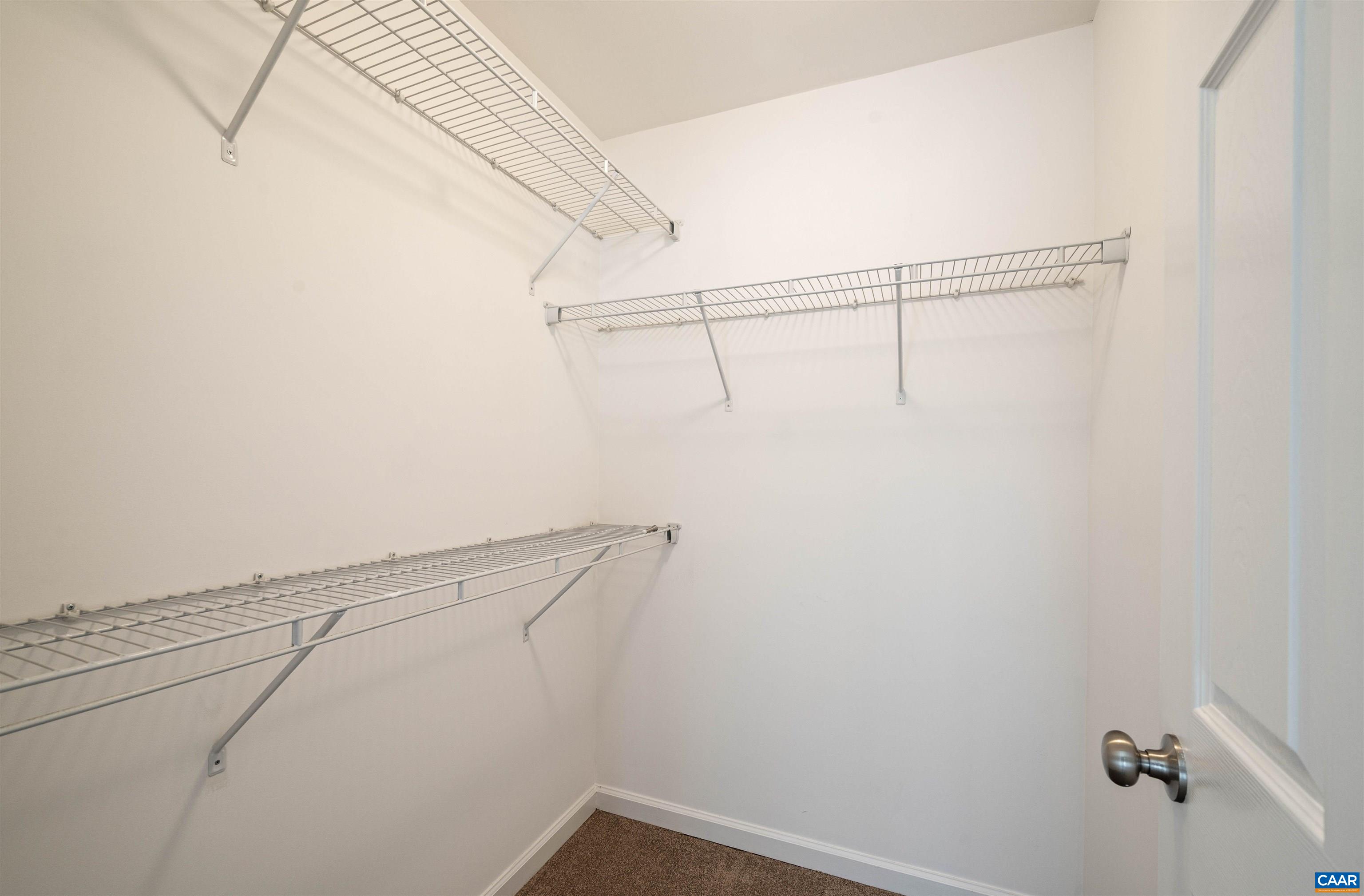 709 Rainier Road Charlottesville, VA 22903 - Photo 34 of 53 a view of a room with racks on the wall