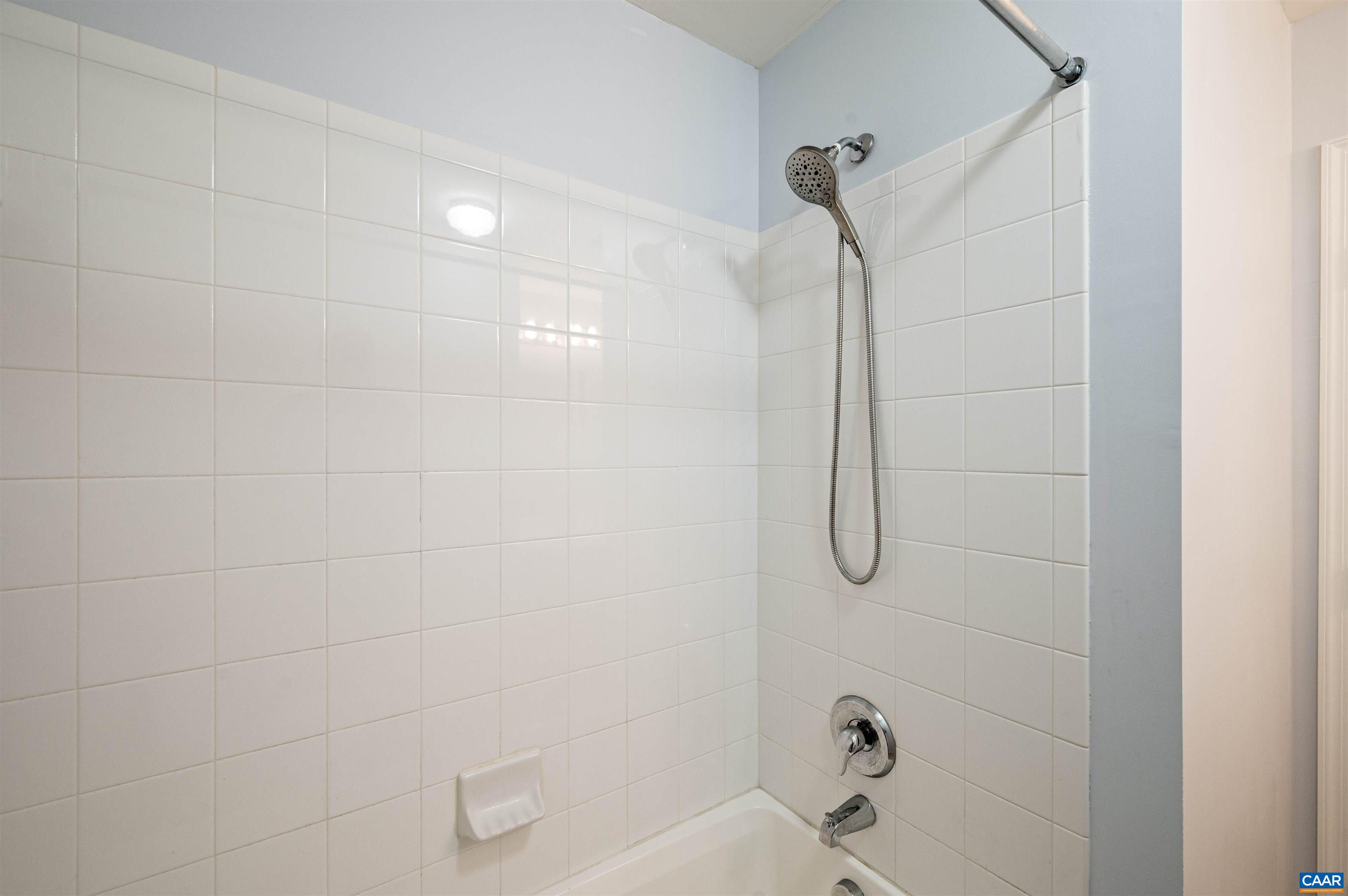 709 Rainier Road Charlottesville, VA 22903 - Photo 43 of 53 a bathroom with a glass shower door