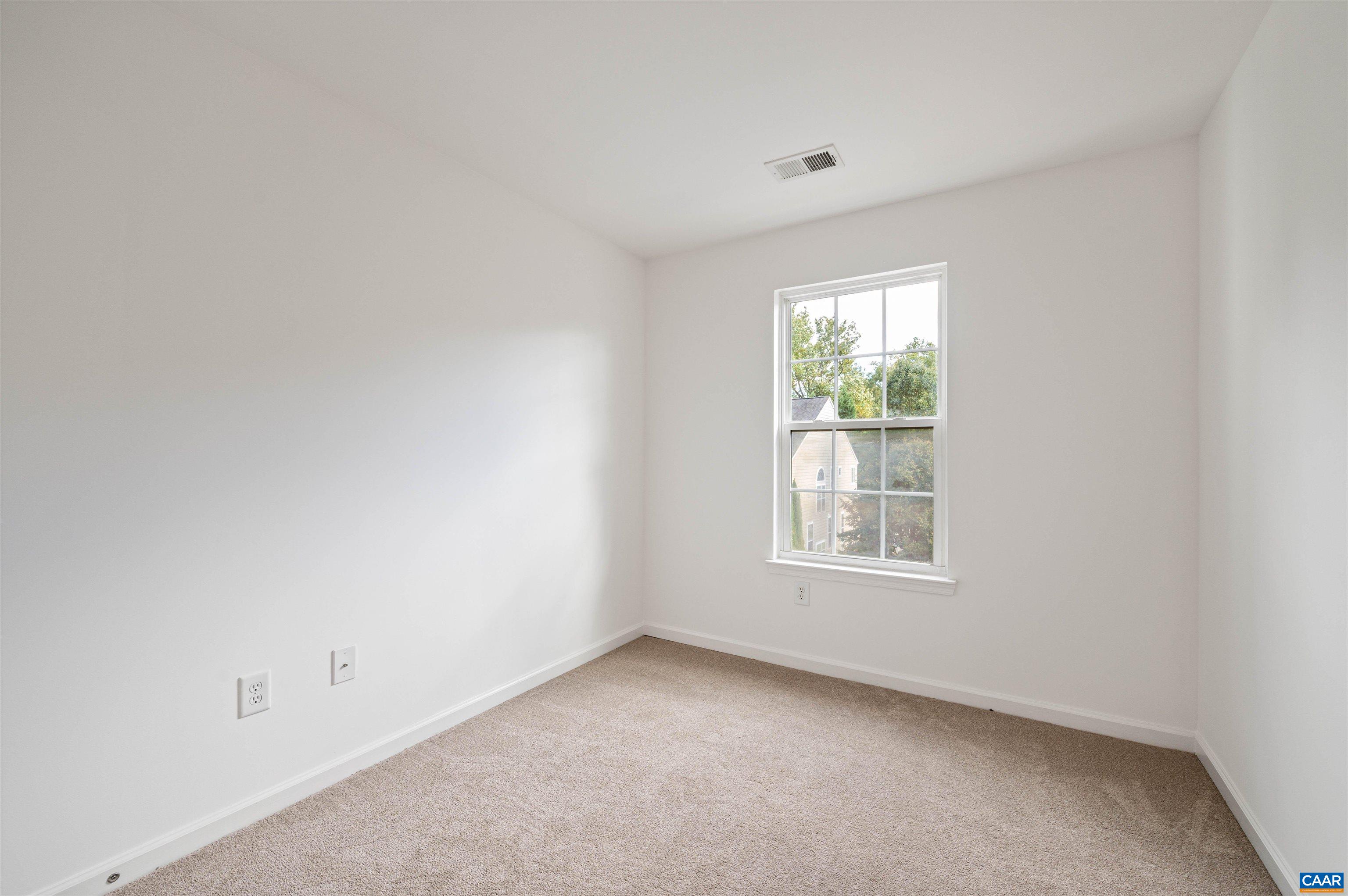 709 Rainier Road Charlottesville, VA 22903 - Photo 44 of 53 an empty room with windows