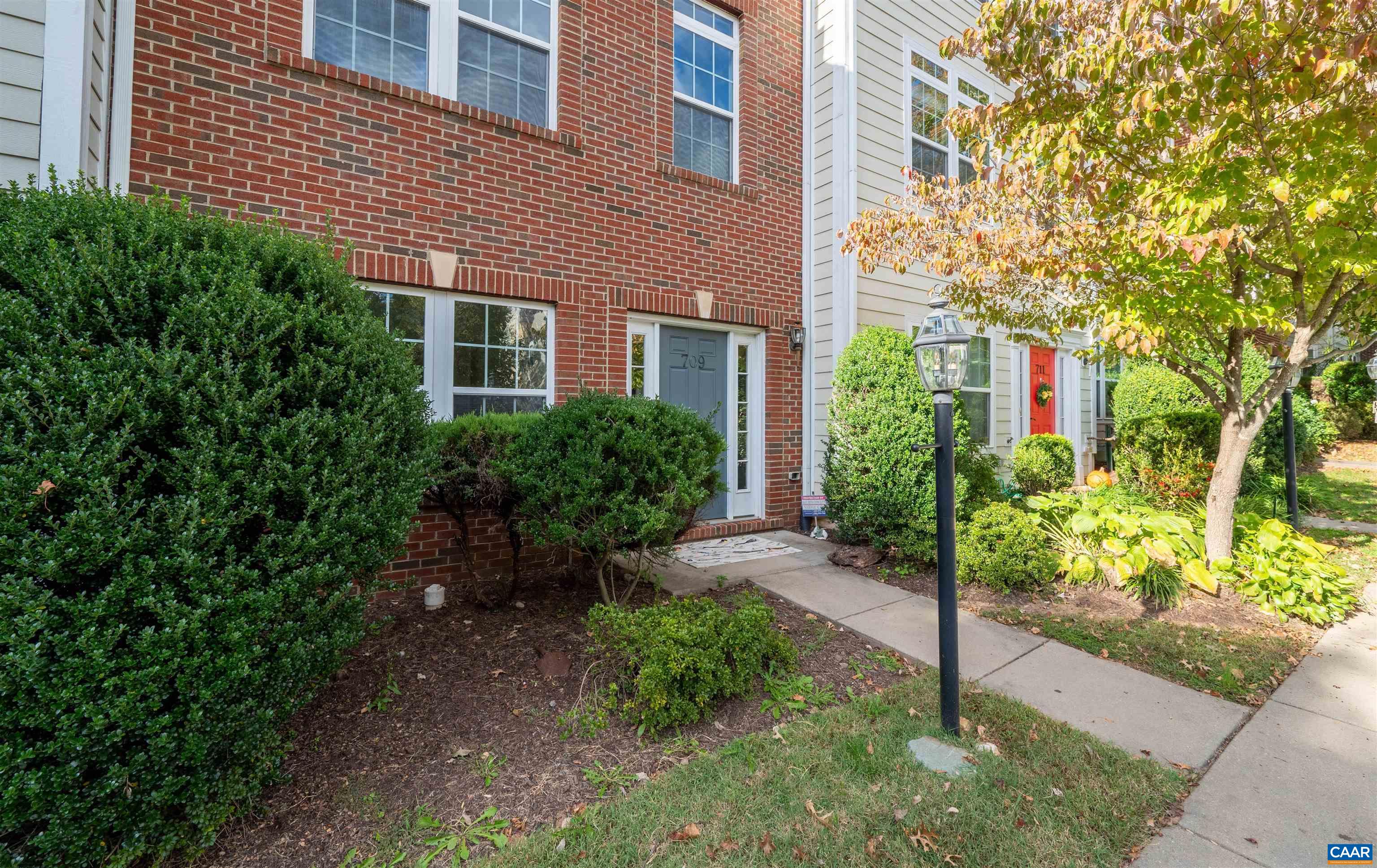 709 Rainier Road Charlottesville, VA 22903 - Photo 53 of 53 a front view of a house with garden