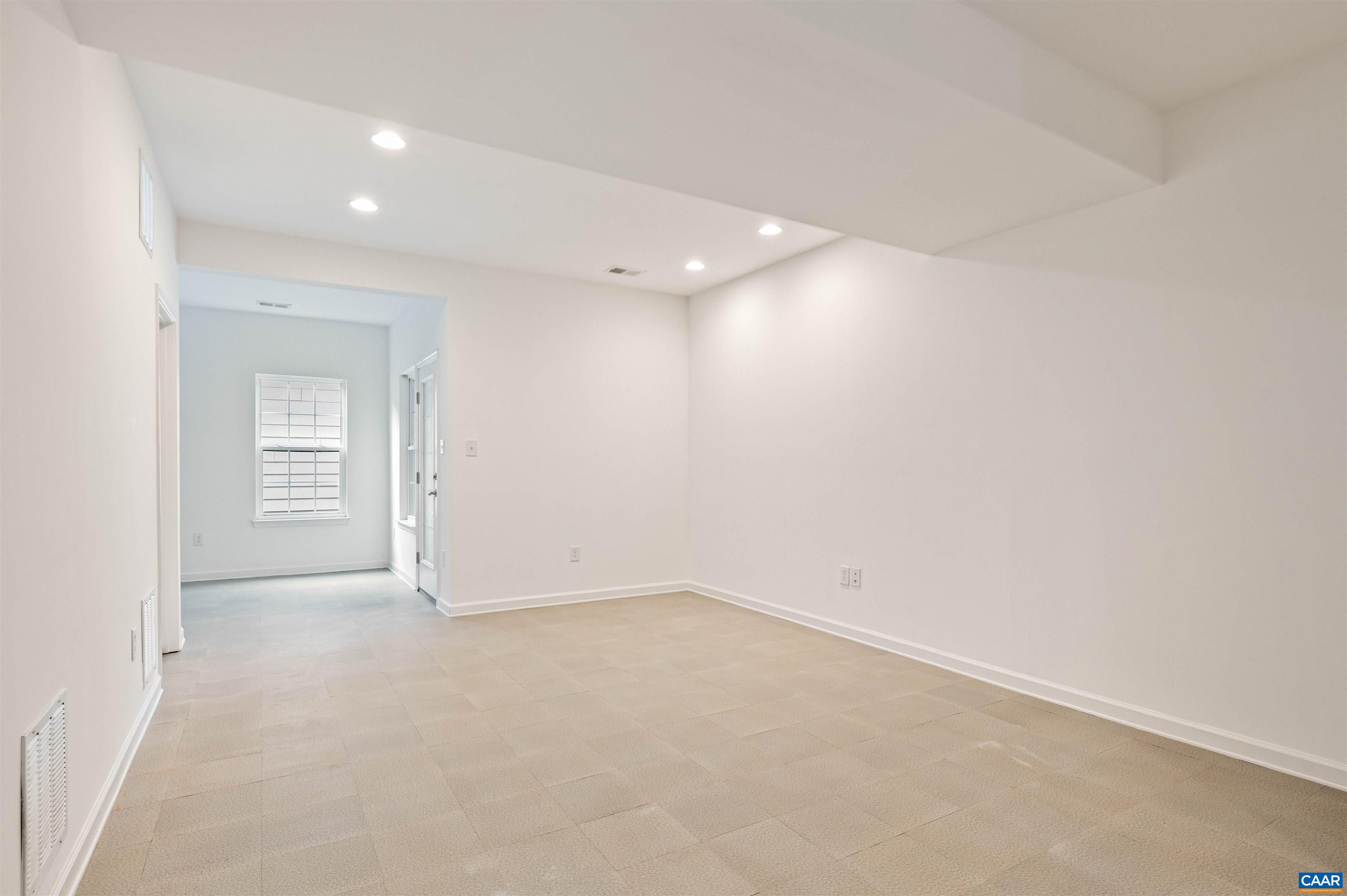 709 Rainier Road Charlottesville, VA 22903 - Photo 6 of 53 an empty room with a natural light