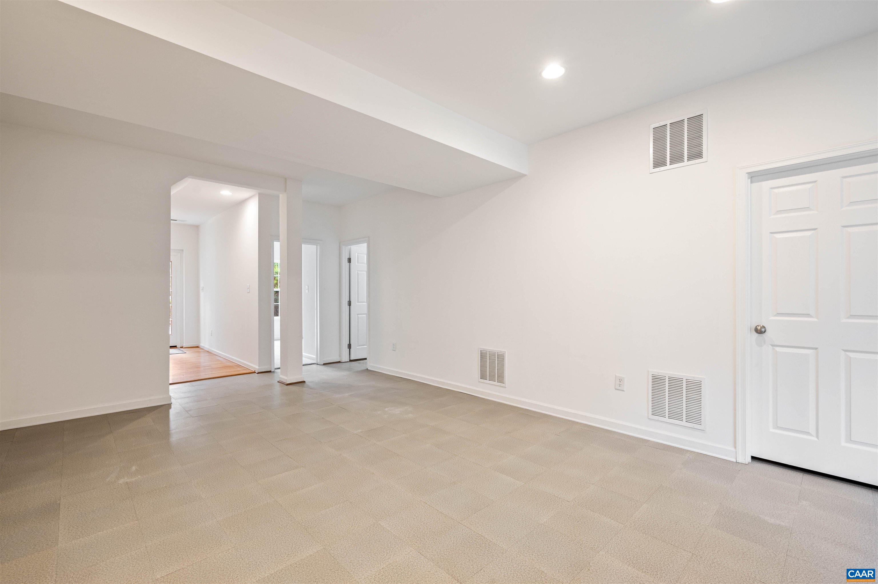 709 Rainier Road Charlottesville, VA 22903 - Photo 7 of 53 an empty room with a natural light