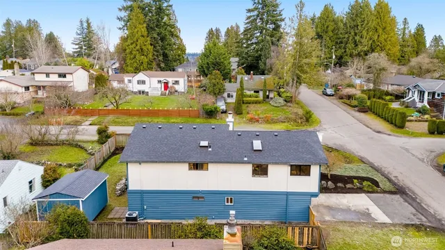 a aerial view of a house with a big yard