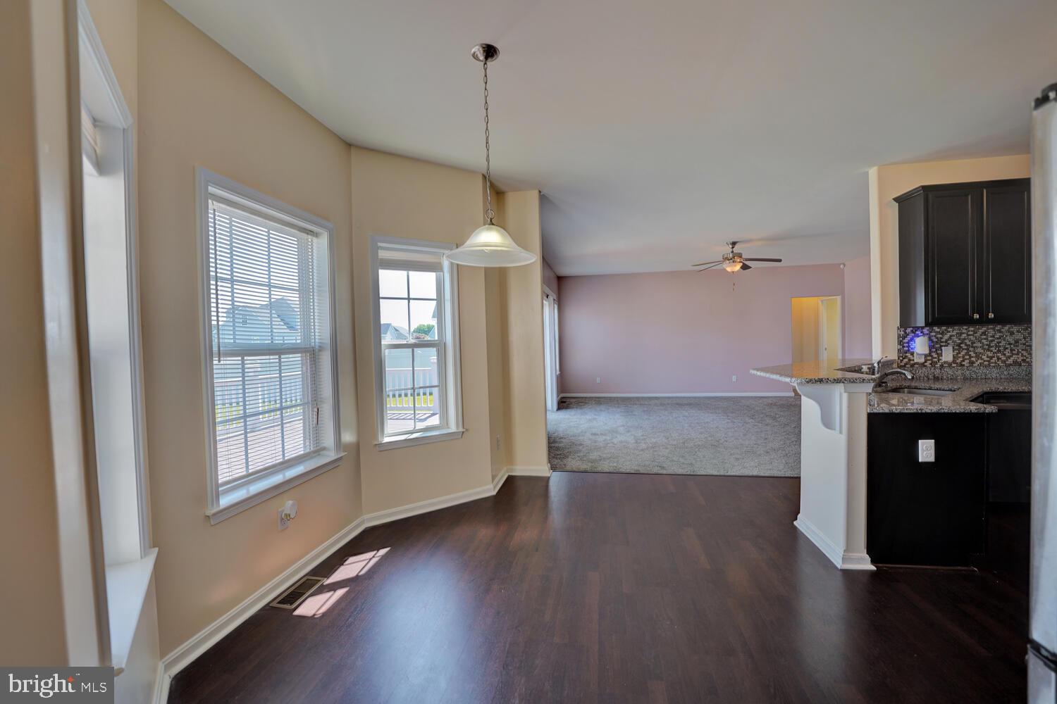 167 Spring Dale Lane Felton, DE 19943 - Photo 19 of 54 a view of a room with wooden floor and a window