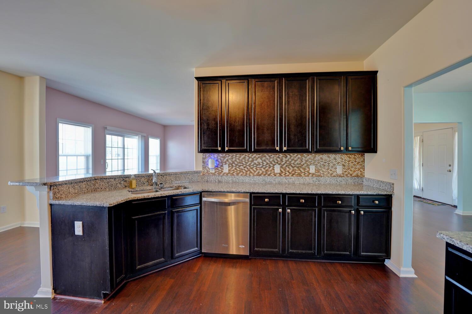 167 Spring Dale Lane Felton, DE 19943 - Photo 24 of 54 a kitchen with a sink and cabinets