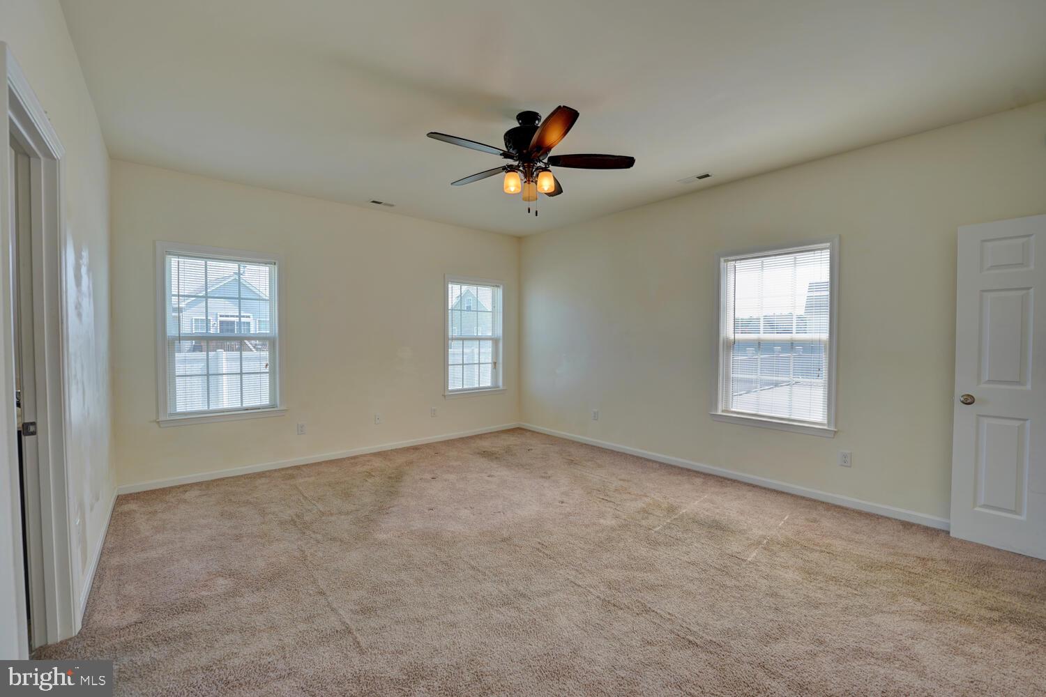 167 Spring Dale Lane Felton, DE 19943 - Photo 29 of 54 a view of a livingroom with a ceiling fan and window